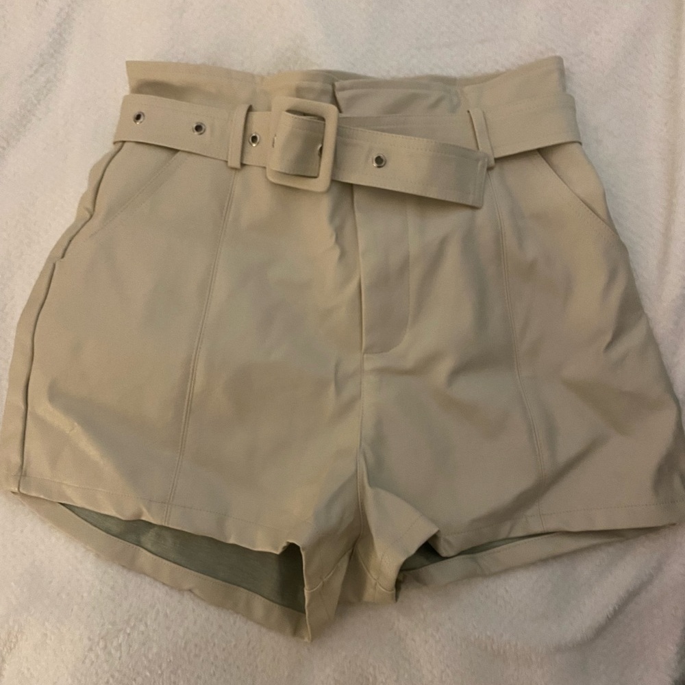 White leather shorts